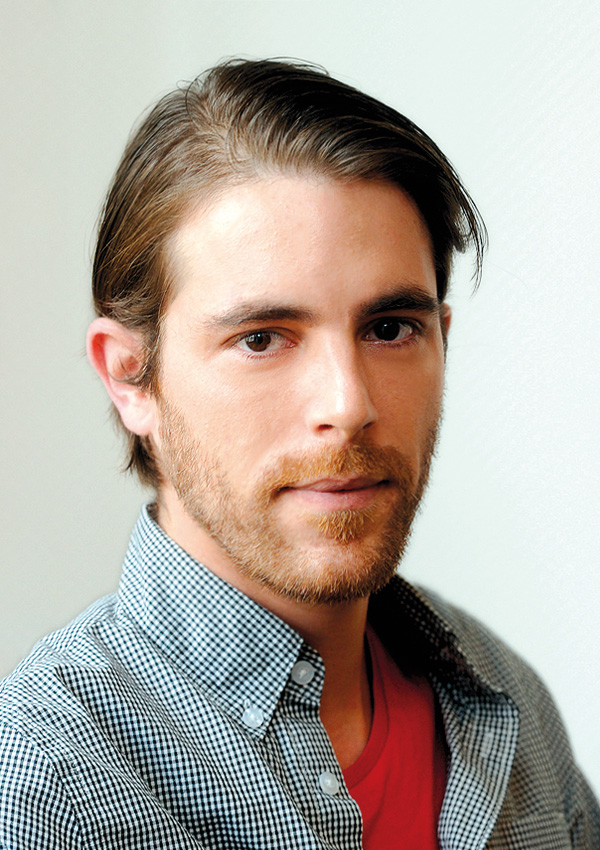 Portrait vum Marc Dostert, Fotograf hannert AM FOKUS