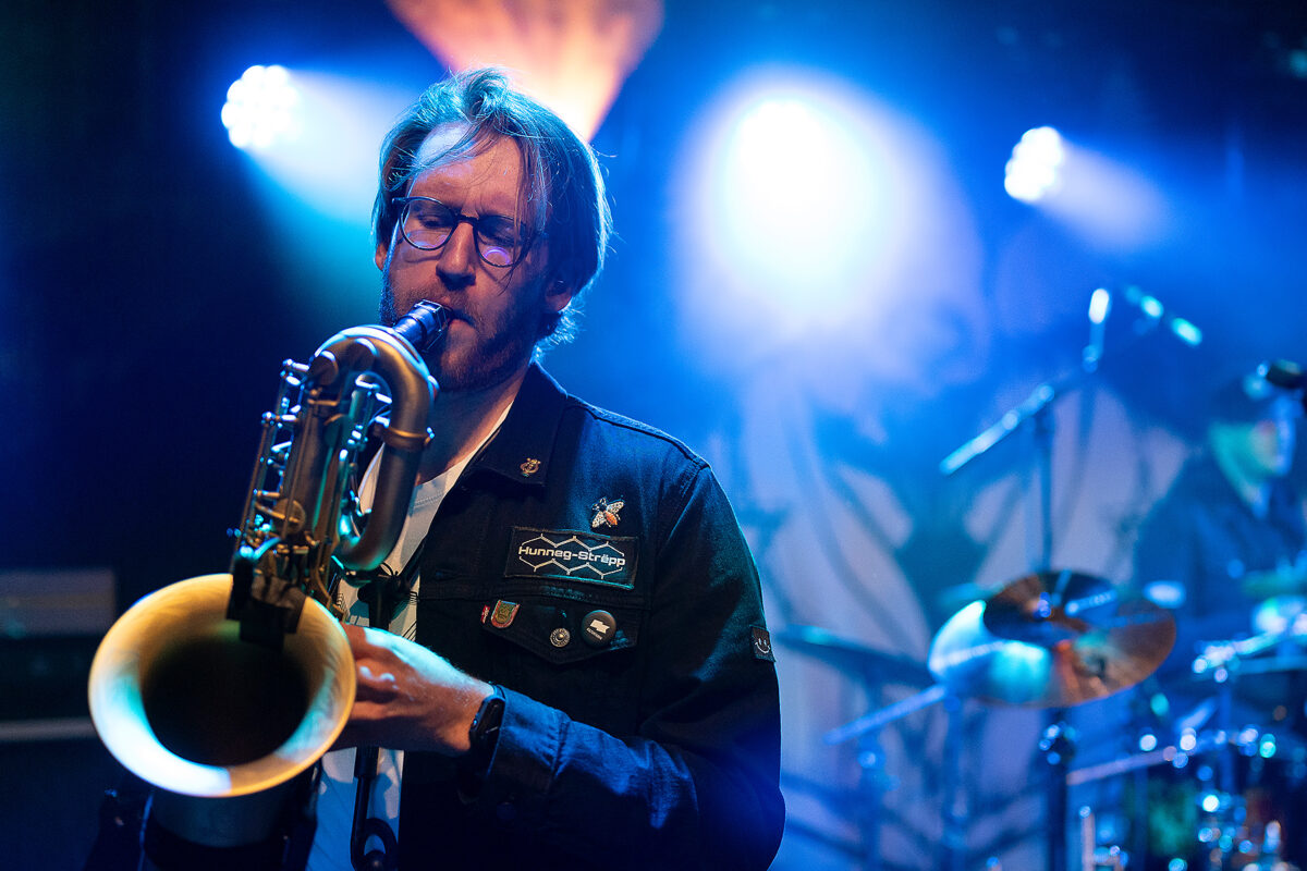 Saxophonist of Hunneg-Strëpp live on stage, event photography for organisers by Am Fokus Luxembourg